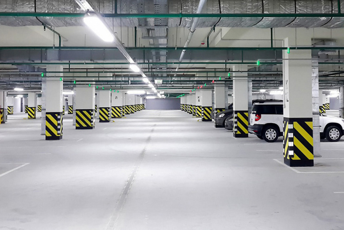 Упрочнение бетона в паркингах: причины необходимости использования упрочнителей